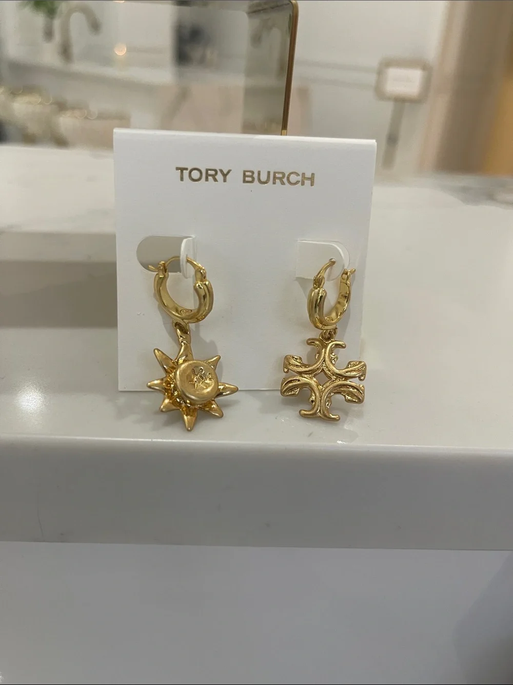 Tory Burch Gold Sun and Cross Drop Huggie Earrings